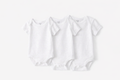 Carter's white onesie set showing all 3 sizes - Newborn, 3M, and 6M flat lay